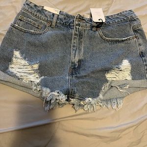 Distressed denim shorts